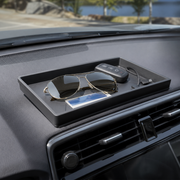 Noviquieo DashNest Console Organizer Tray holding small drive essentials