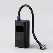 Noviquieo AirPulse Portable Inflator in Noviquieo graphite tech product photography