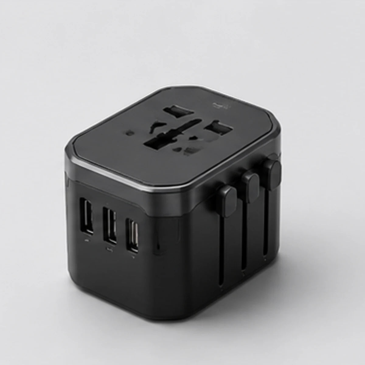 Noviquieo VoltPort Travel Adapter in Noviquieo graphite tech product photography