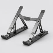 Noviquieo FlexRise Device Stand in Noviquieo graphite tech product photography